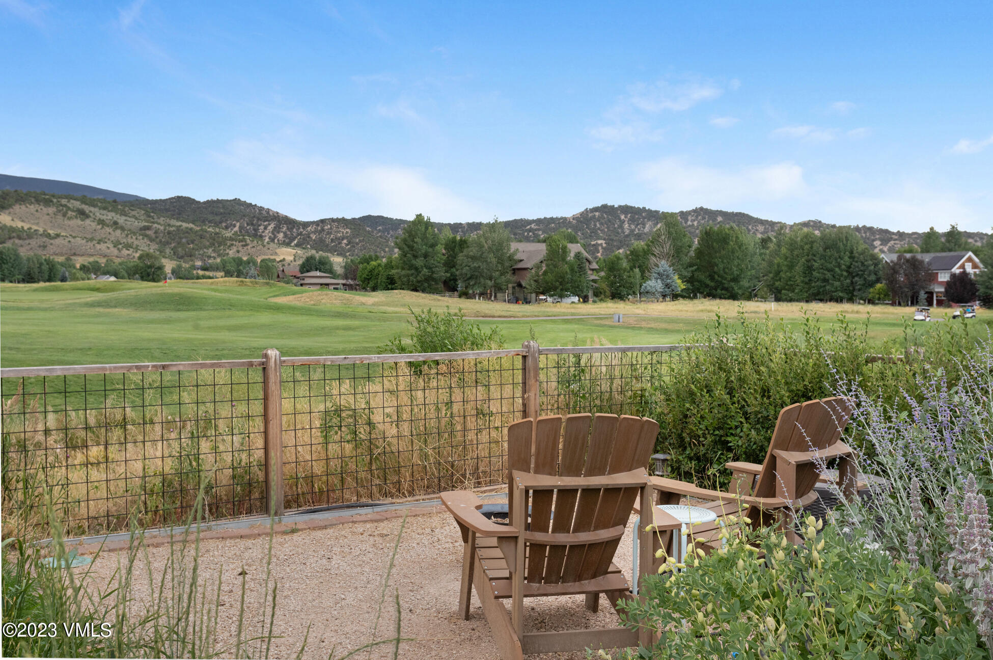 275 Robins Egg Eagle, CO 81631 - Photo 33 of 46 a view of a lake with a chairs