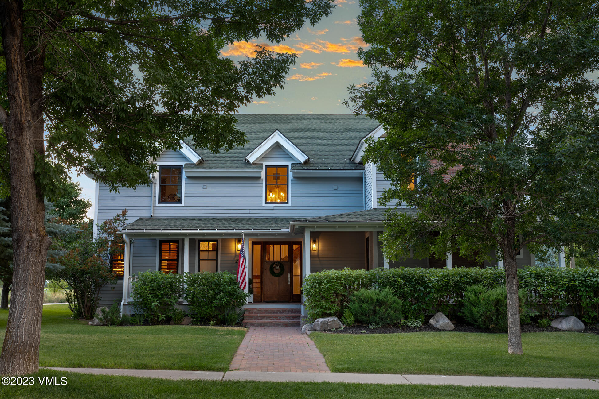 275 Robins Egg Eagle, CO 81631 - Photo 42 of 46 a front view of a house with a yard