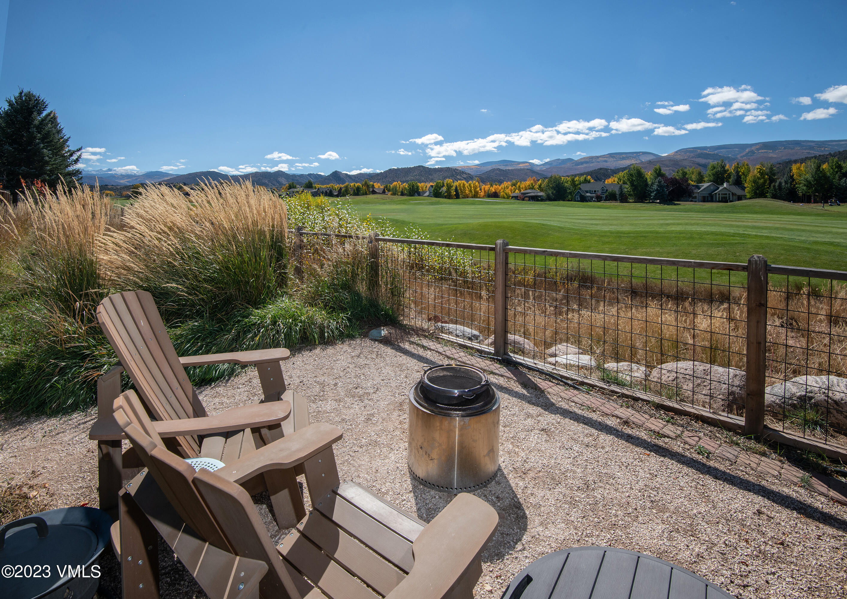 275 Robins Egg Eagle, CO 81631 - Photo 45 of 46 a view of a chairs and table in patio with a lake view