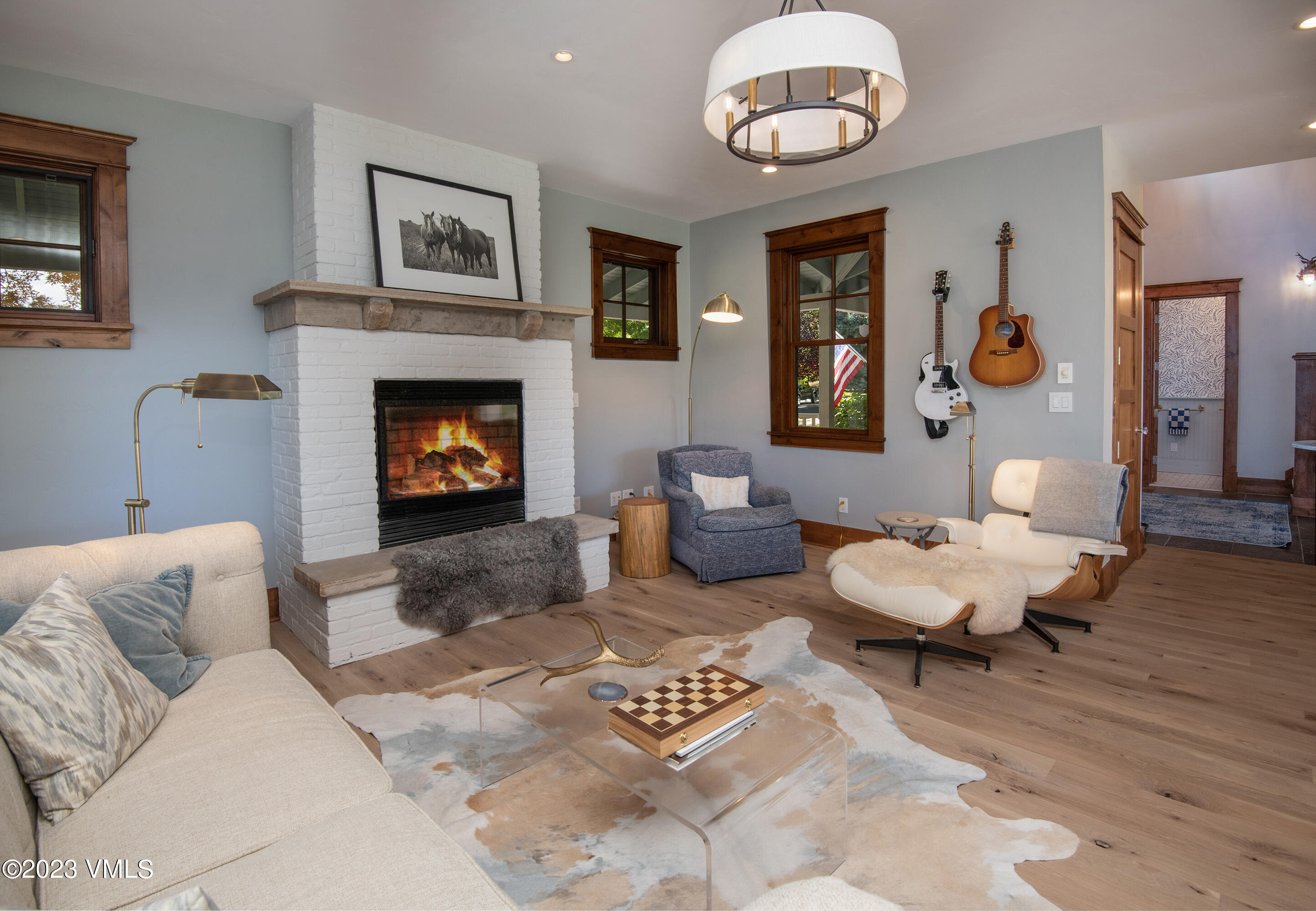 275 Robins Egg Eagle, CO 81631 - Photo 10 of 46 a living room with furniture and a fireplace