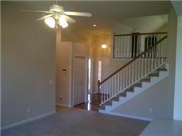 Upgrades include a large bonus room, as well as a hard wood foyer that leads to secondary bedrooms. 