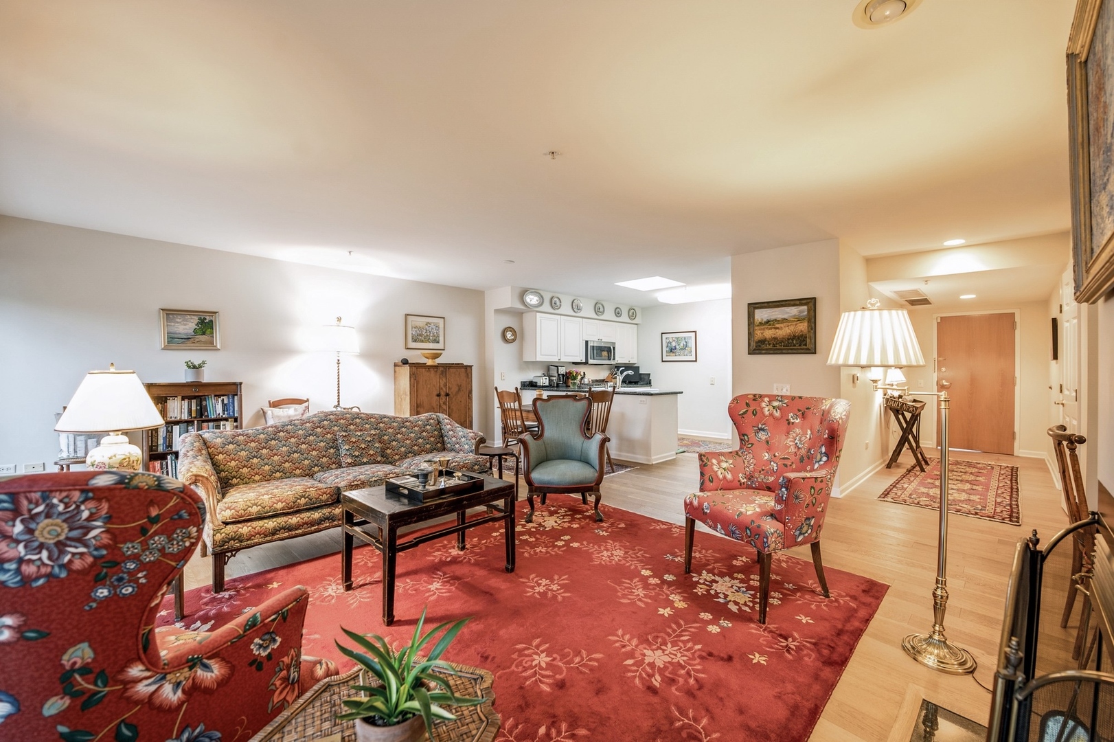 360 Green Bay Road, Unit 4C Winnetka, IL 60093 - Photo 6 of 16 a living room with furniture kitchen view and a table