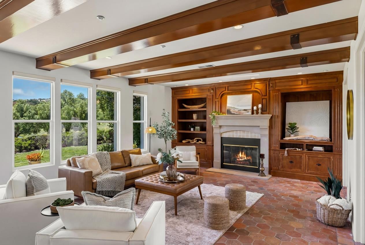 302 Pasadera Drive Monterey, CA 93940 - Photo 4 of 40 a living room with furniture large window and a fireplace