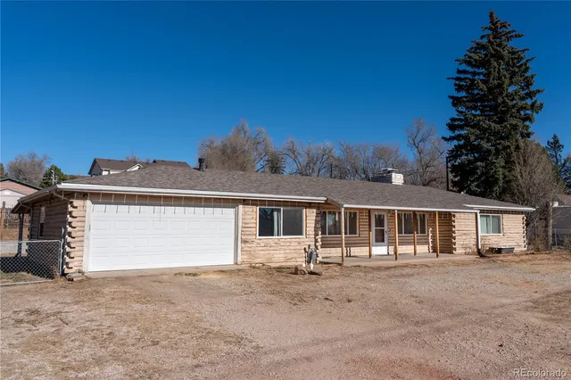 front view of a house with a street