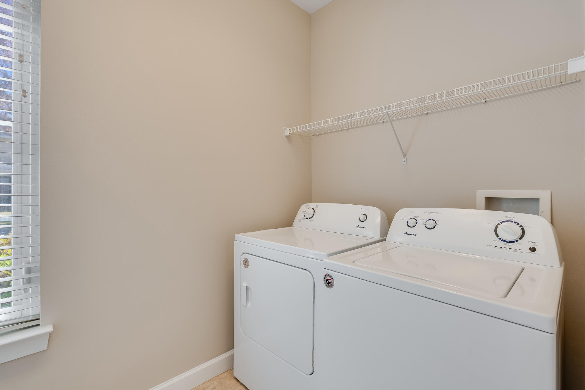174 South Zander Way Santa Rosa Beach, FL 32459 - Photo 16 of 20 a utility room with dryer and washer
