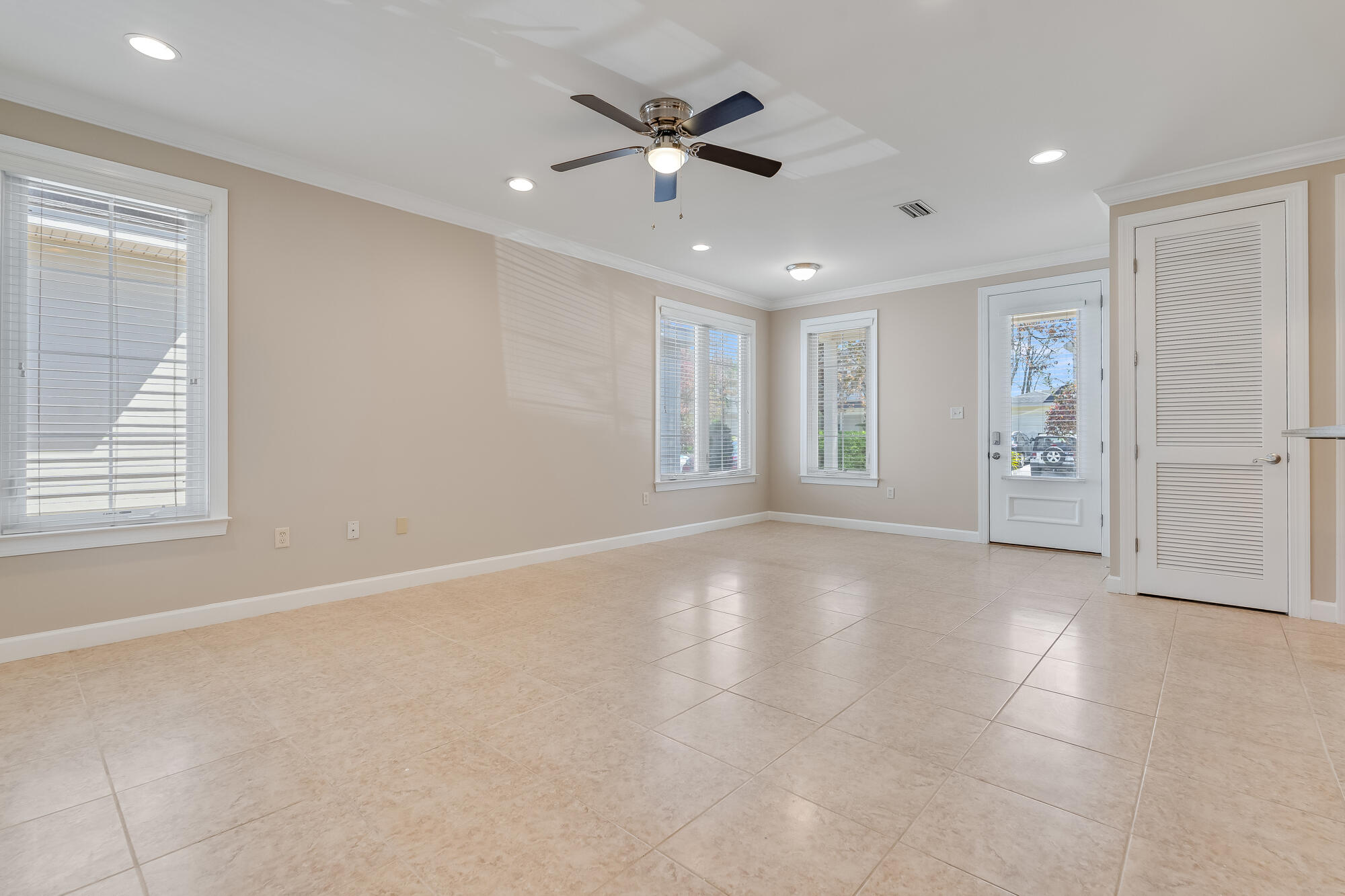 174 South Zander Way Santa Rosa Beach, FL 32459 - Photo 6 of 20 an empty room with fan and windows