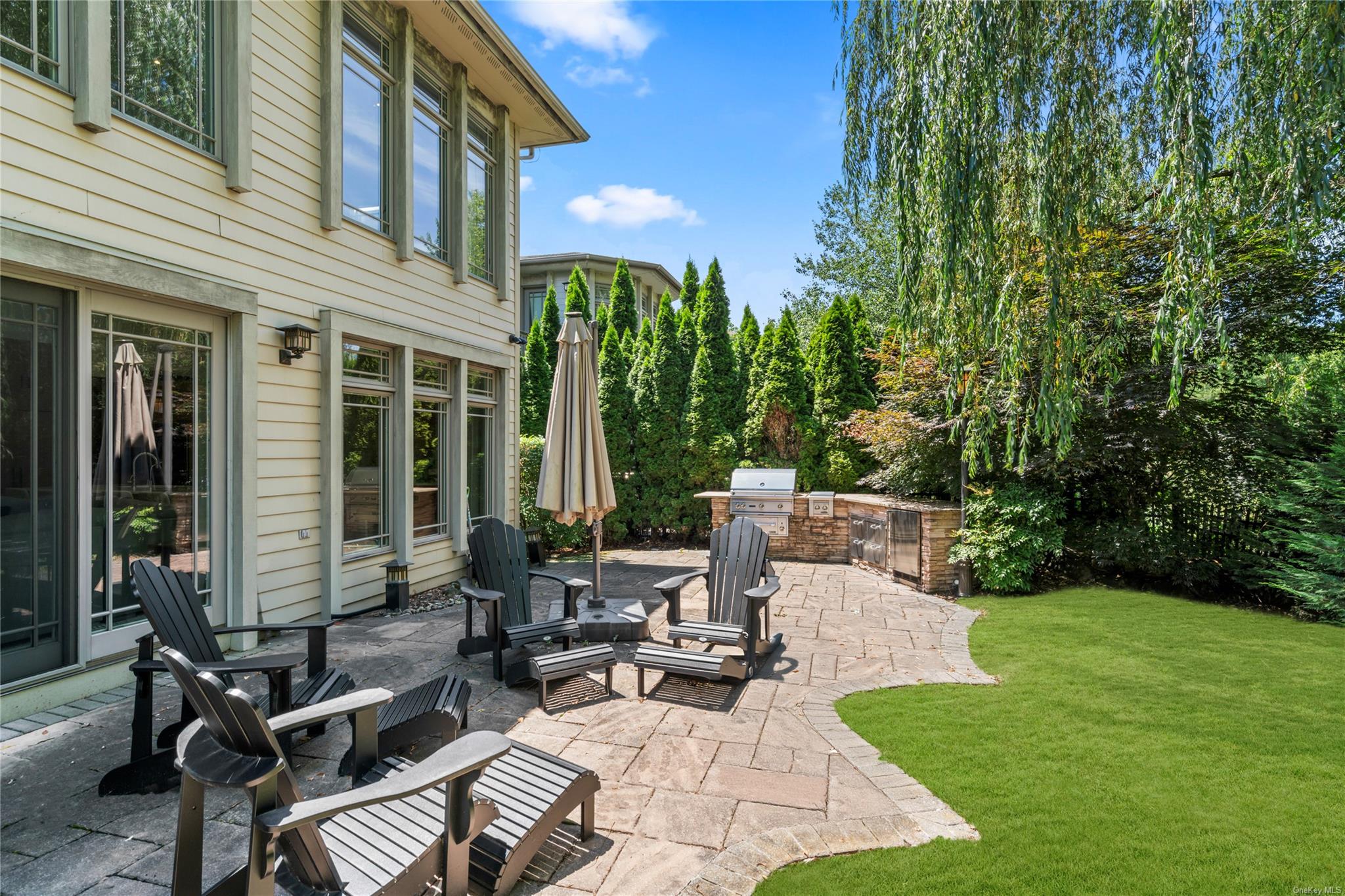 8 Holiday Pond Road Jericho, NY 11753 - Photo 36 of 43 View of patio featuring an outdoor kitchen