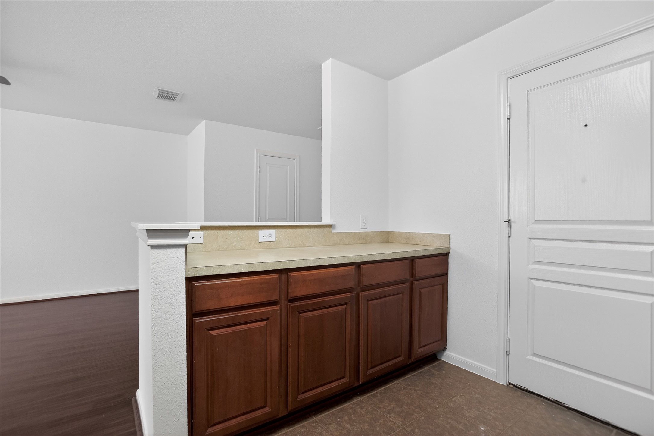 1618 Grable Cove Lane Spring, TX 77379 - Photo 13 of 32 Extra built-in counter and cabinet space creates the perfect opportunity for a cozy coffee nook, wine bar, or convenient storage solution.
