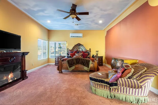 a large bathroom with a large tub and sink