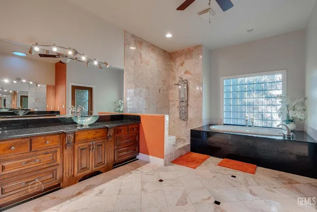 a livingroom with workspace and a window