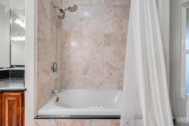 a view of a livingroom with furniture and fireplace