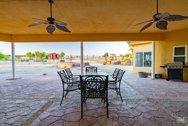 a view of a lake with beach and trees