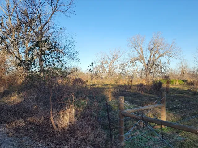 a view of a backyard of a house