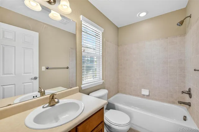 a bathroom with a sink toilet a shower and a bathtub