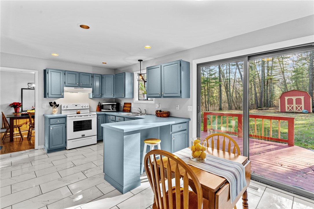 155 Whaley Hollow Road Coventry, RI 02816 - Photo 15 of 31 Sliders to back deck.