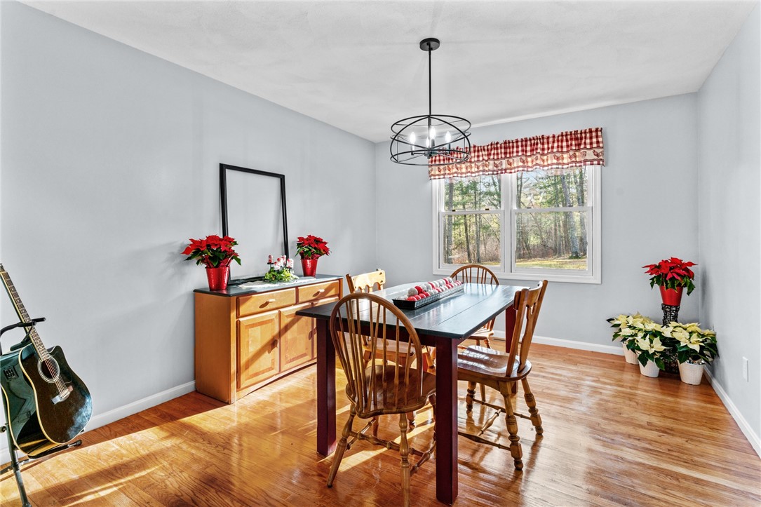 155 Whaley Hollow Road Coventry, RI 02816 - Photo 18 of 31 Dining room with views of back yard.