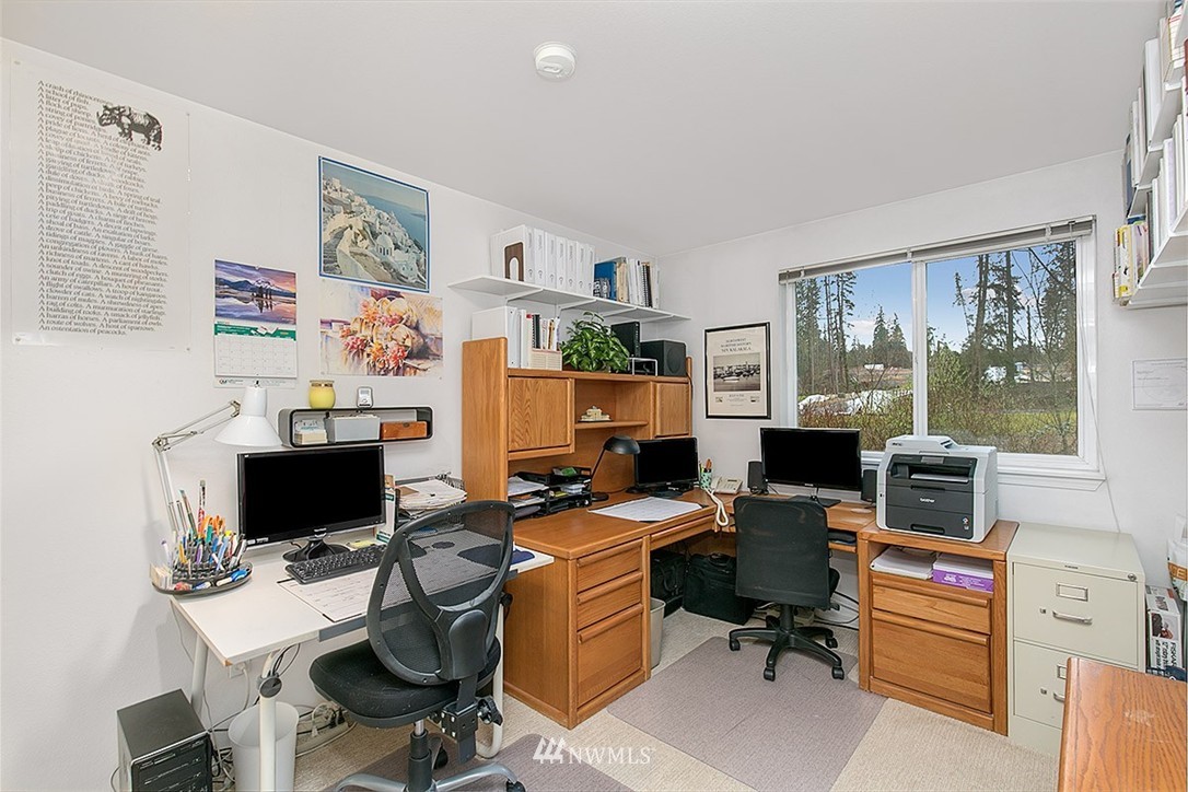 23131 15th Avenue Southeast, Unit H4 Bothell, WA 98021 - Photo 14 of 16 a view of a workspace with furniture and a window