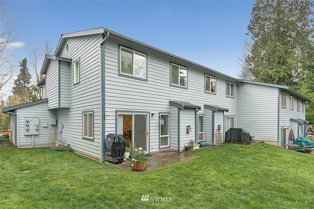 23131 15th Avenue Southeast, Unit H4 Bothell, WA 98021 - Photo 15 of 16 a view of a house with a backyard