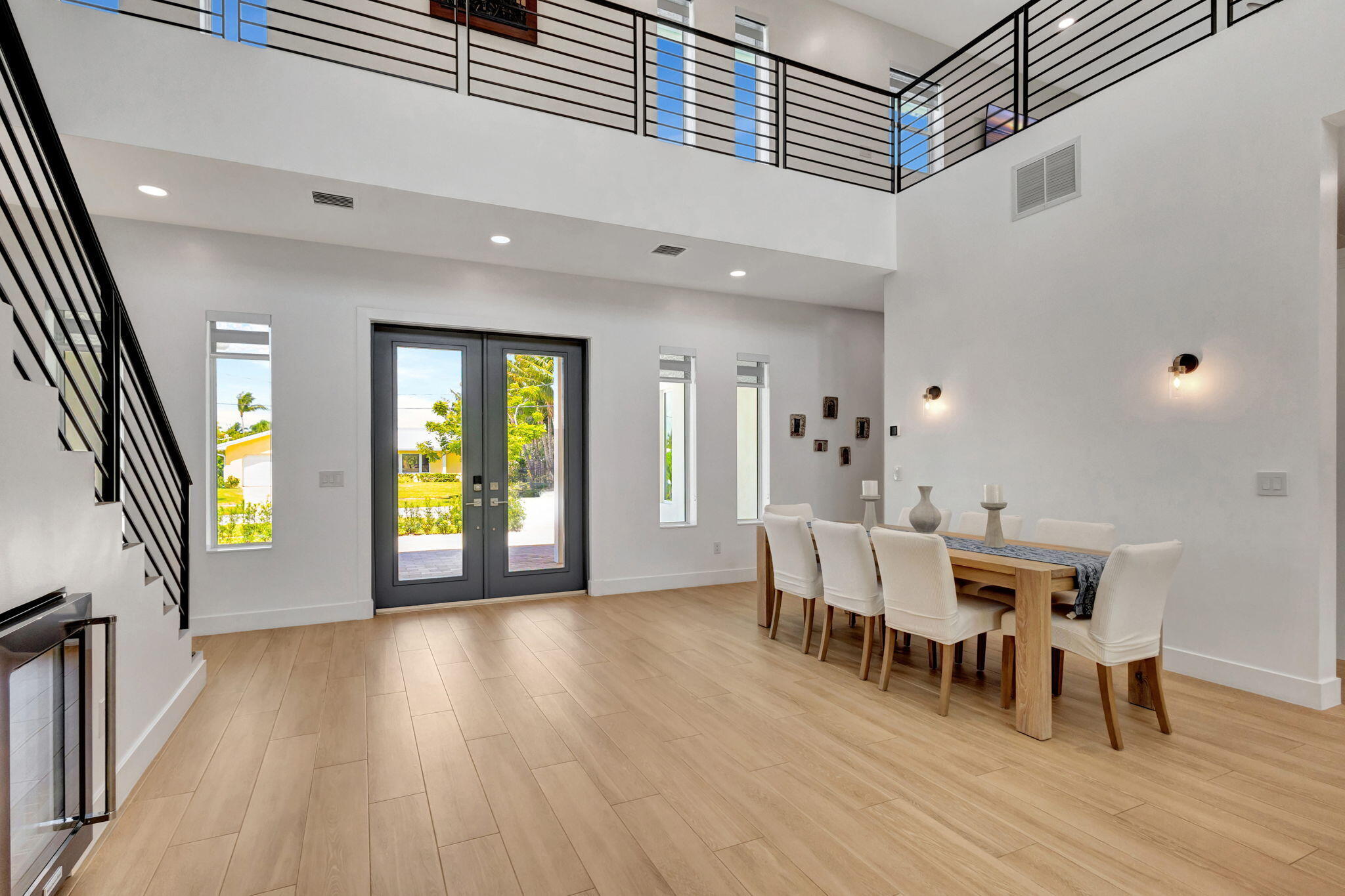 12952 Drayton Road North Palm Beach, FL 33408 - Photo 24 of 109 a view of a dining room with furniture and wooden floor