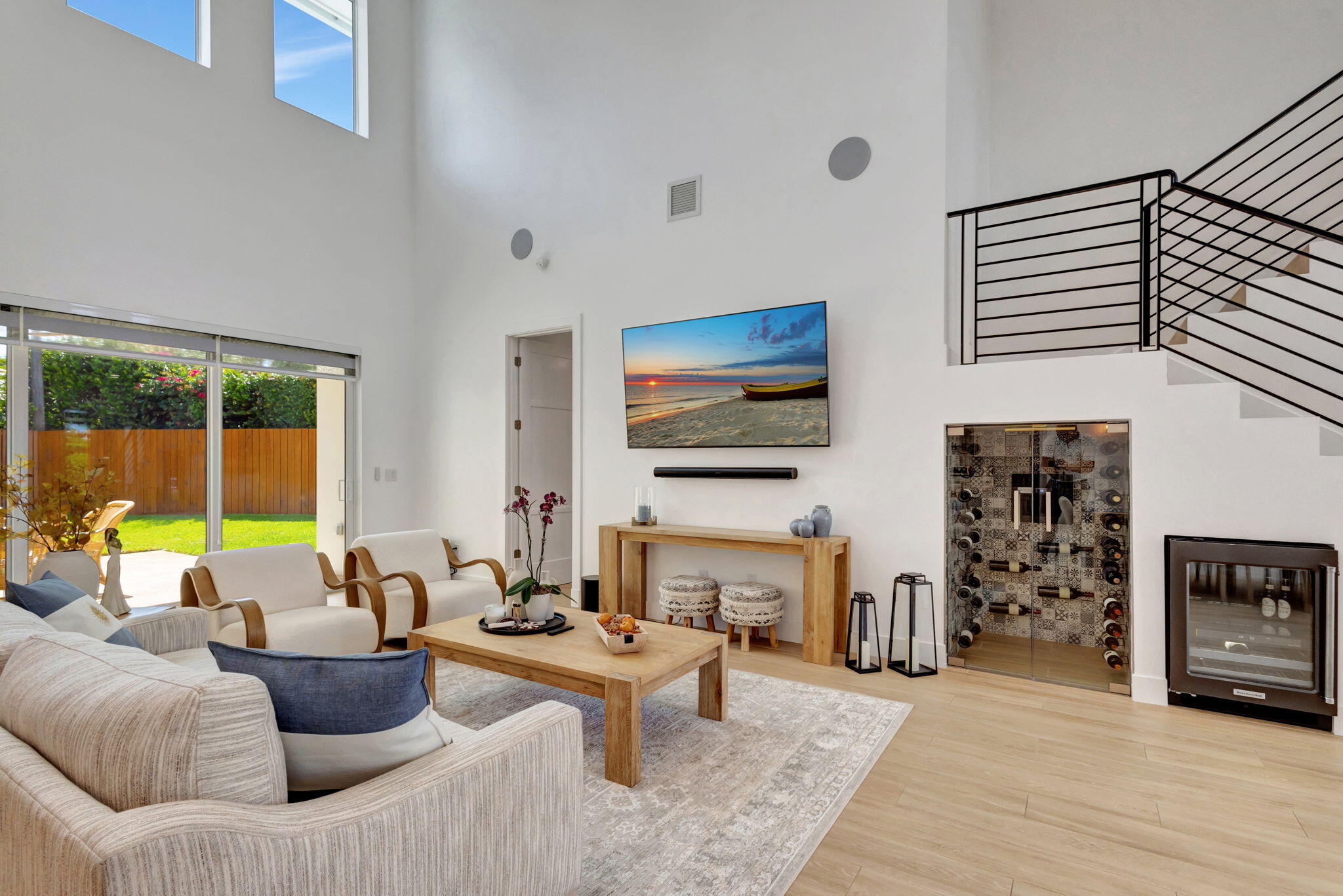12952 Drayton Road North Palm Beach, FL 33408 - Photo 26 of 109 a living room with furniture and a flat screen tv