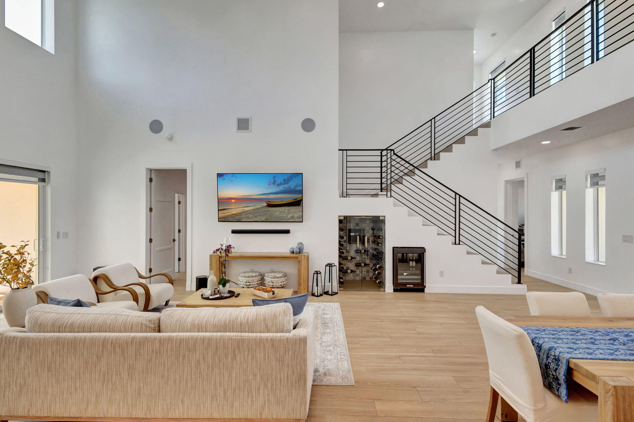 12952 Drayton Road North Palm Beach, FL 33408 - Photo 27 of 109 a living room with furniture and a flat screen tv