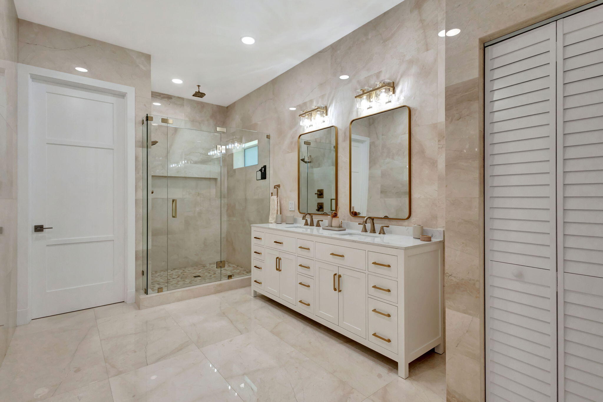 12952 Drayton Road North Palm Beach, FL 33408 - Photo 48 of 109 a bathroom with a double vanity sink mirror double and shower