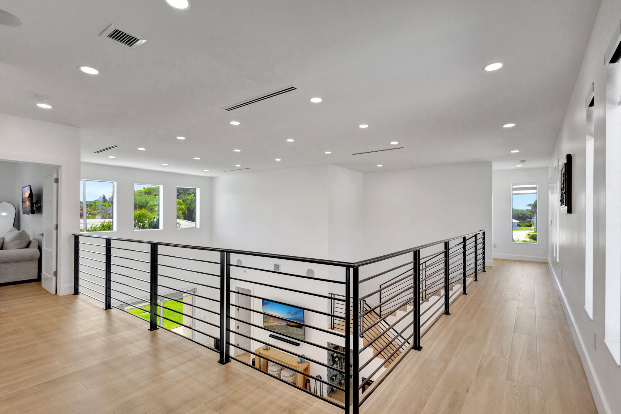 12952 Drayton Road North Palm Beach, FL 33408 - Photo 60 of 109 a view of a hallway with a living room