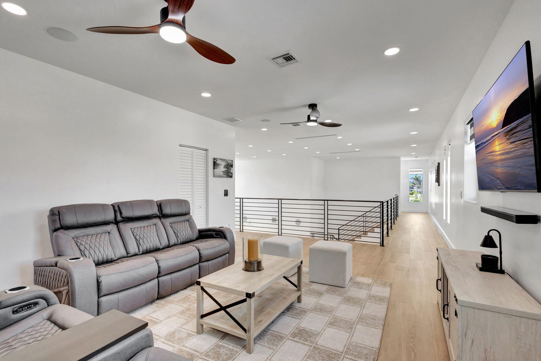 12952 Drayton Road North Palm Beach, FL 33408 - Photo 63 of 109 a living room with furniture and a flat screen tv