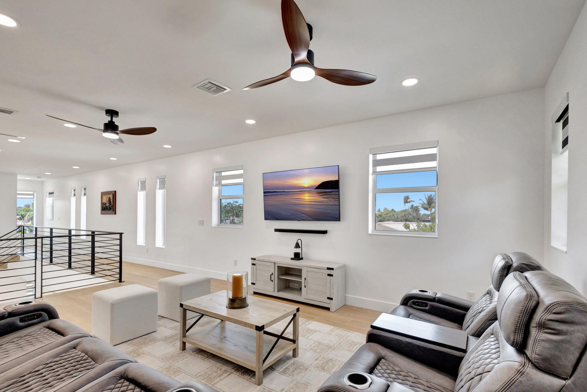 12952 Drayton Road North Palm Beach, FL 33408 - Photo 64 of 109 a living room with furniture and a flat screen tv