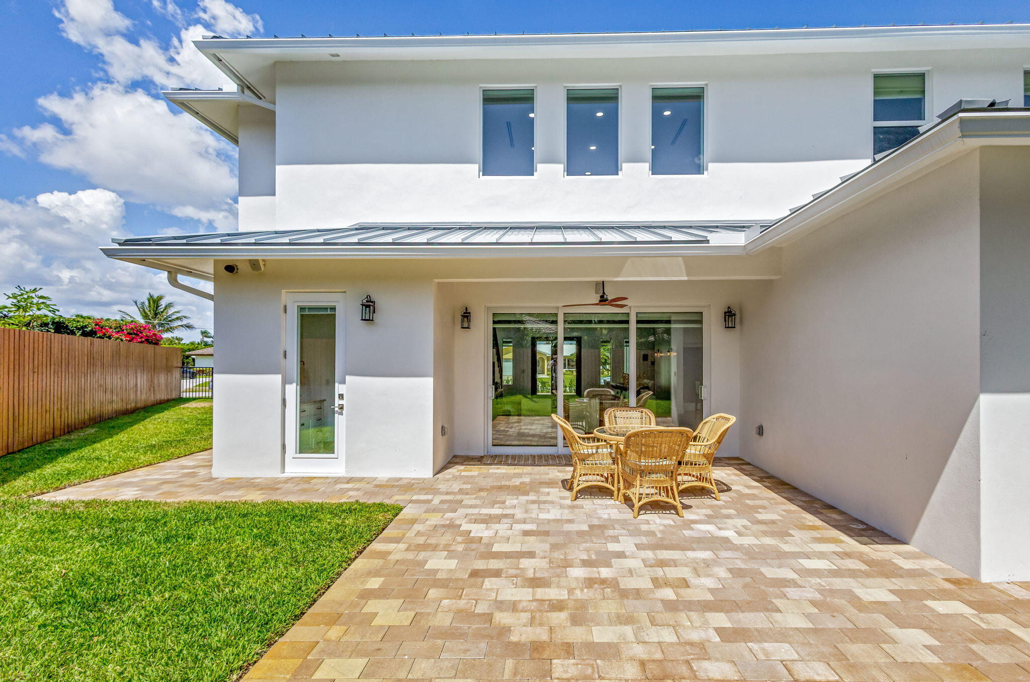 12952 Drayton Road North Palm Beach, FL 33408 - Photo 84 of 109 a view of a house with backyard porch and sitting area
