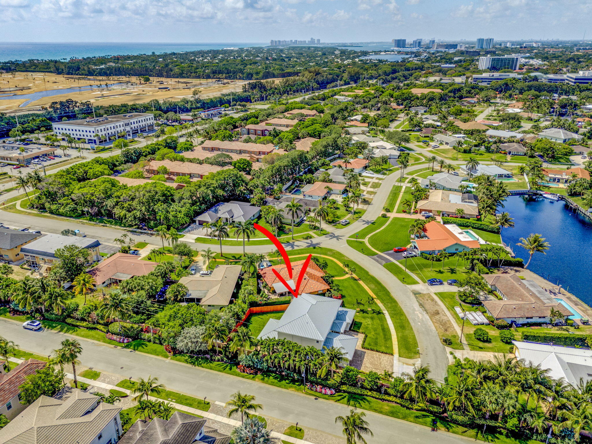 12952 Drayton Road North Palm Beach, FL 33408 - Photo 100 of 109 an aerial view of residential houses with outdoor space and swimming pool