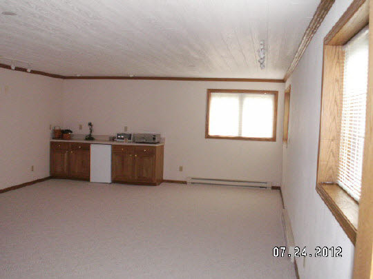 11884 Lerwick Road Caledonia, IL 61011 - Photo 11 of 11 an empty room with windows