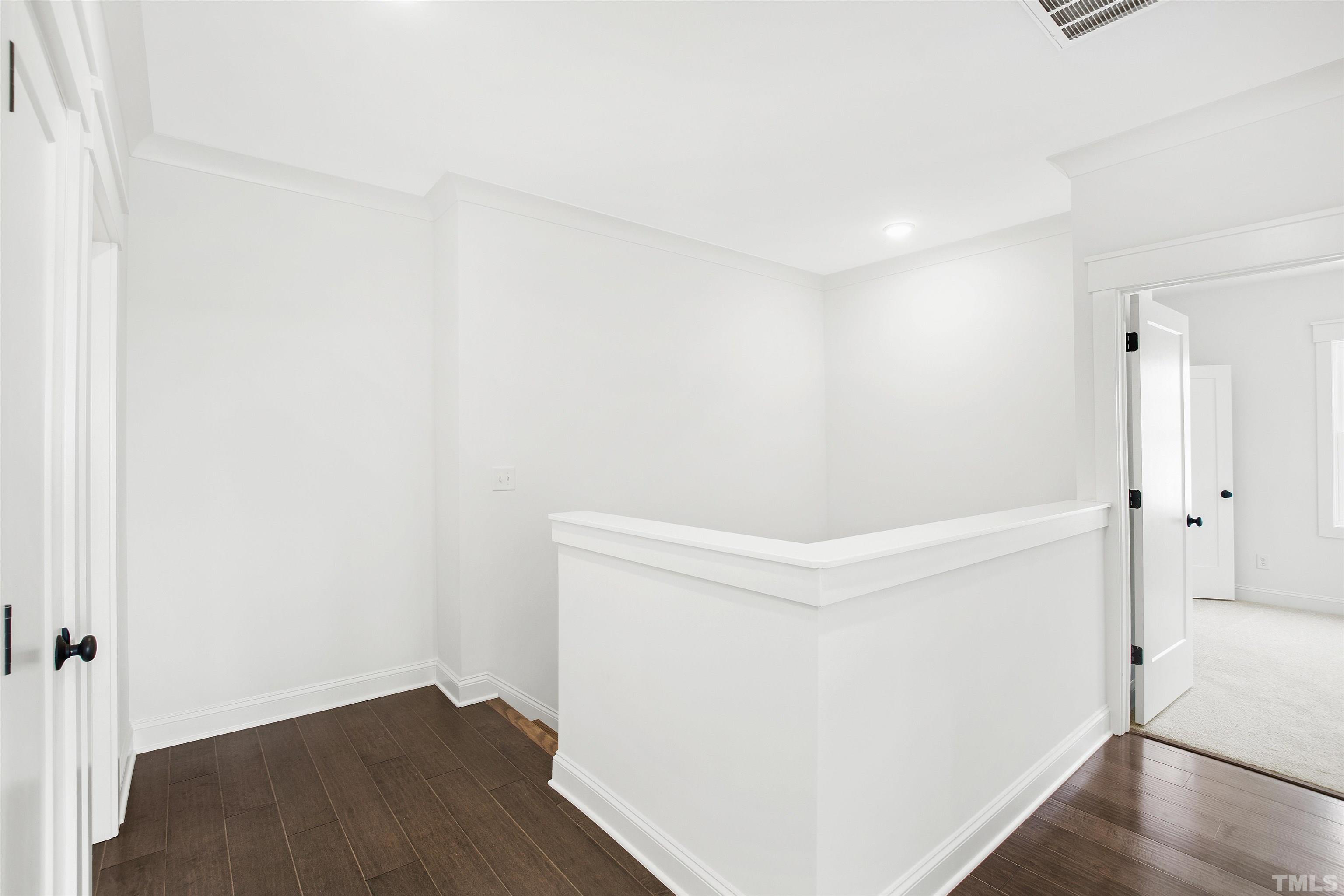 7512 Pinecrest Road Raleigh, NC 27613 - Photo 29 of 47 a view of an empty room