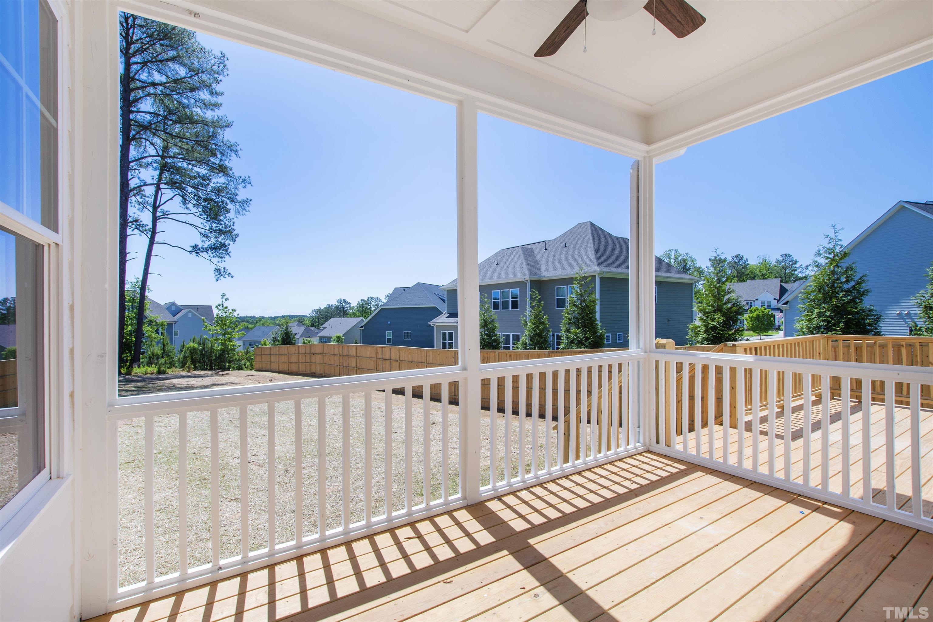 7512 Pinecrest Road Raleigh, NC 27613 - Photo 41 of 47 a view of balcony with wooden floor and fence