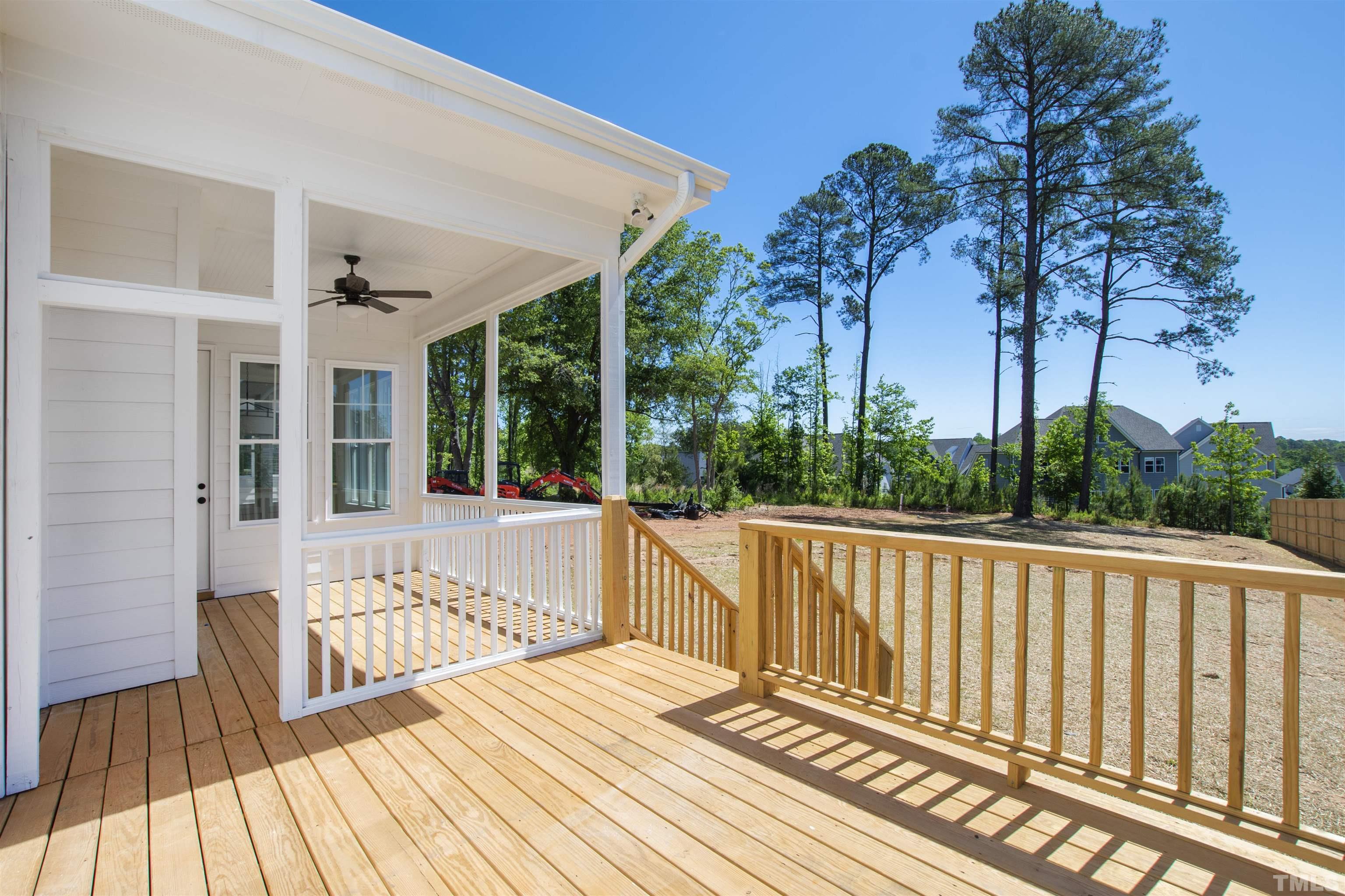 7512 Pinecrest Road Raleigh, NC 27613 - Photo 43 of 47 a view of balcony with wooden floor and fence