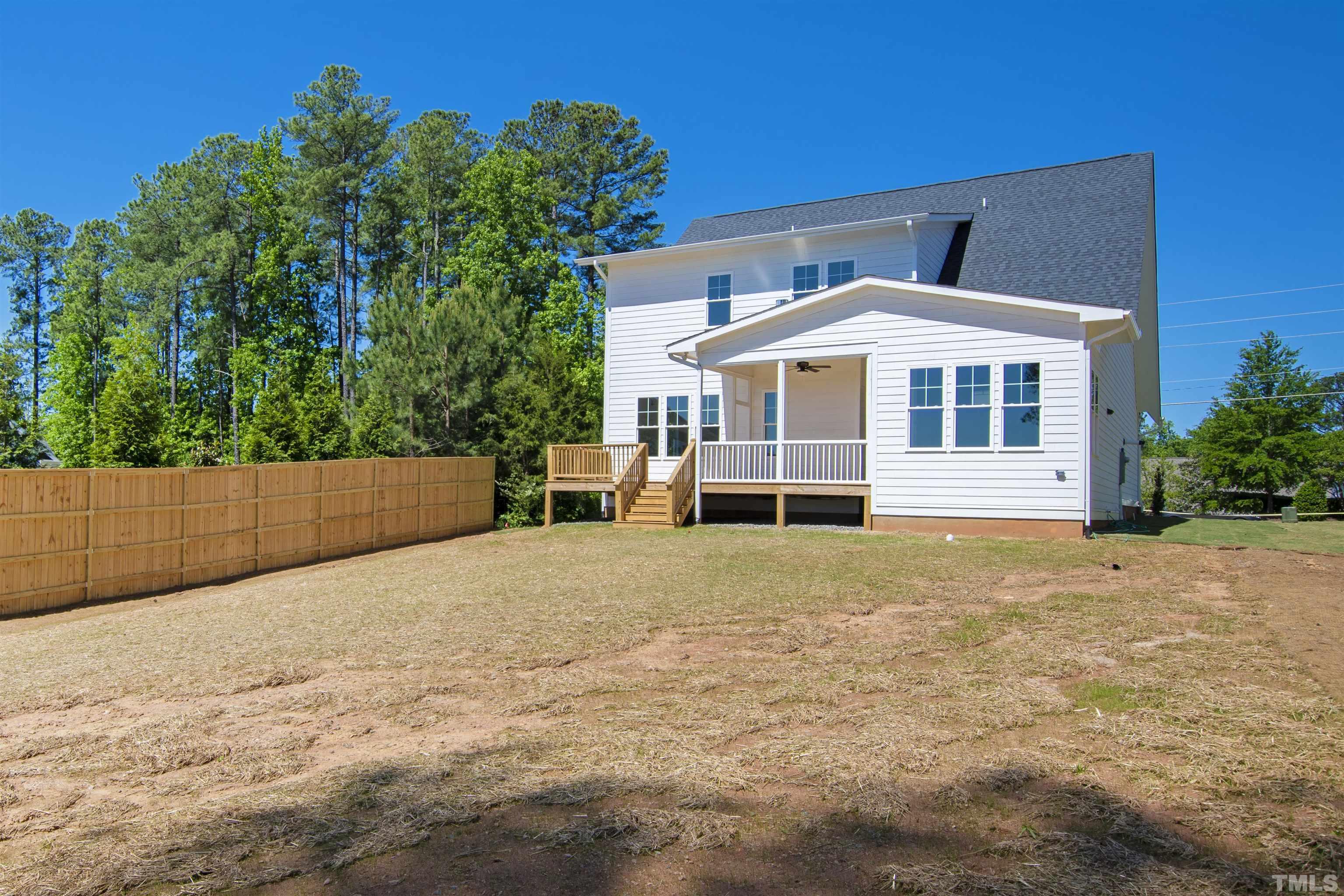 7512 Pinecrest Road Raleigh, NC 27613 - Photo 45 of 47 a front view of a house with a yard