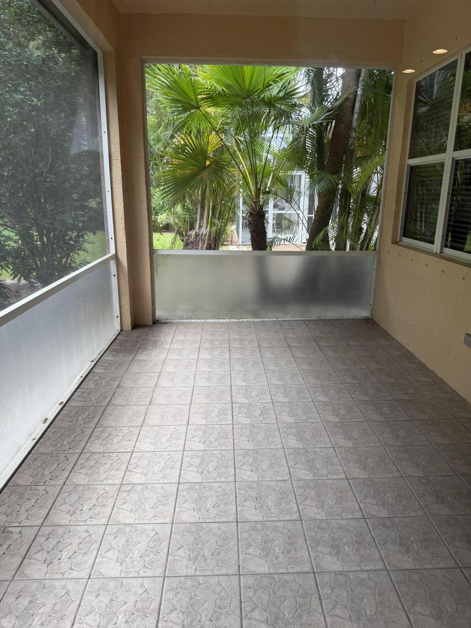 7936 Rockford Road Boynton Beach, FL 33472 - Photo 14 of 14 a view of a garden from a windows