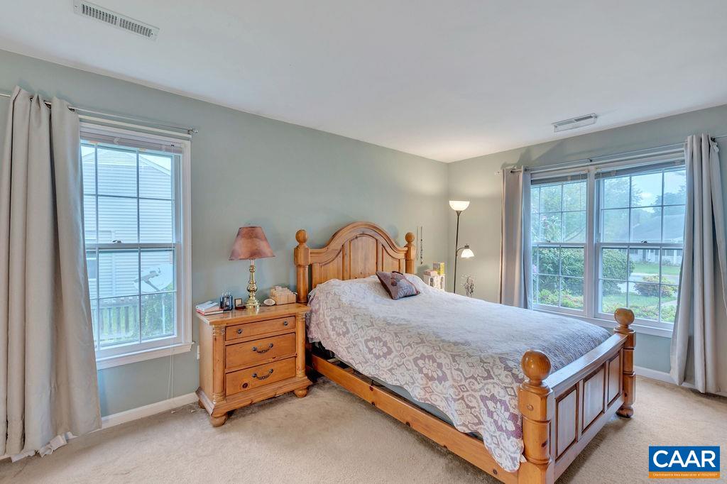 344 Minor Ridge Road Charlottesville, VA 22901 - Photo 17 of 53 a bedroom with a bed and a window