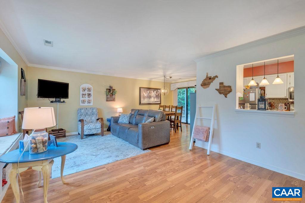 344 Minor Ridge Road Charlottesville, VA 22901 - Photo 6 of 53 a living room with furniture and a flat screen tv