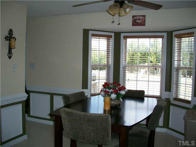 57 Rodney Court Willow Spring, NC 27592 - Photo 6 of 16 a dining room with furniture and window