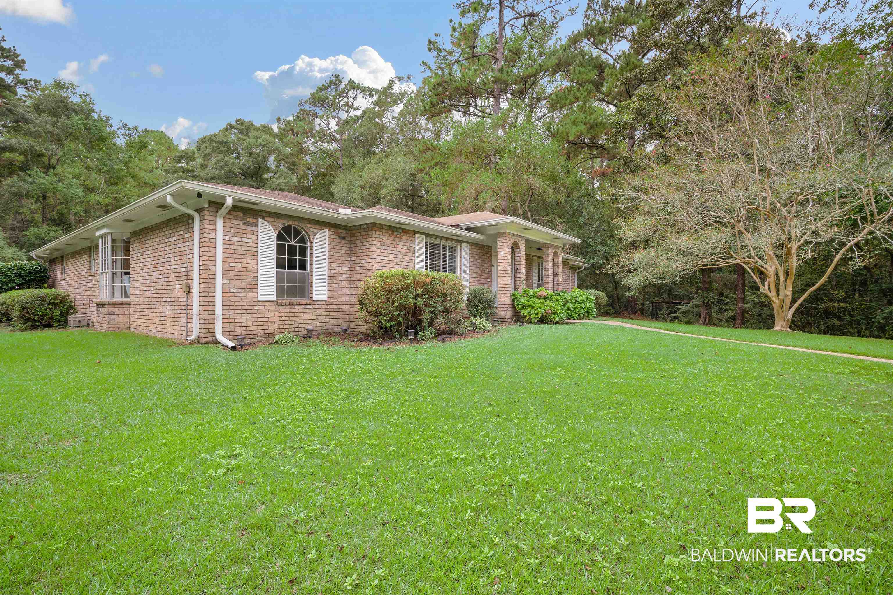 7807 Yorkhaven Road Mobile, AL 36695 - Photo 2 of 34 Ranch-style house with a front lawn and brick siding