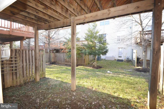 a view of backyard with green space