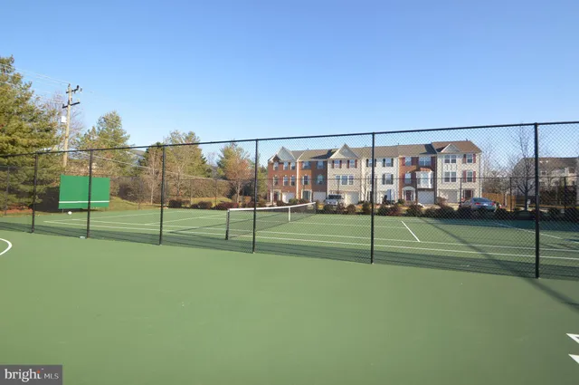 a view of a bench in front of building