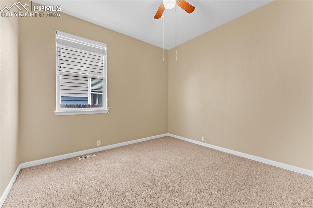 9403 St.George Road Peyton, CO 80831 - Photo 14 of 39 an empty room with a window