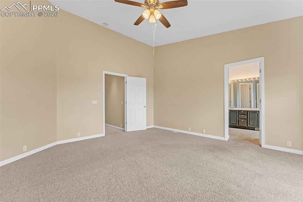 9403 St.George Road Peyton, CO 80831 - Photo 16 of 39 a view of an empty room and chandelier fan