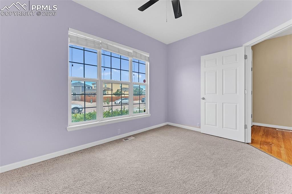 9403 St.George Road Peyton, CO 80831 - Photo 22 of 39 an empty room with windows