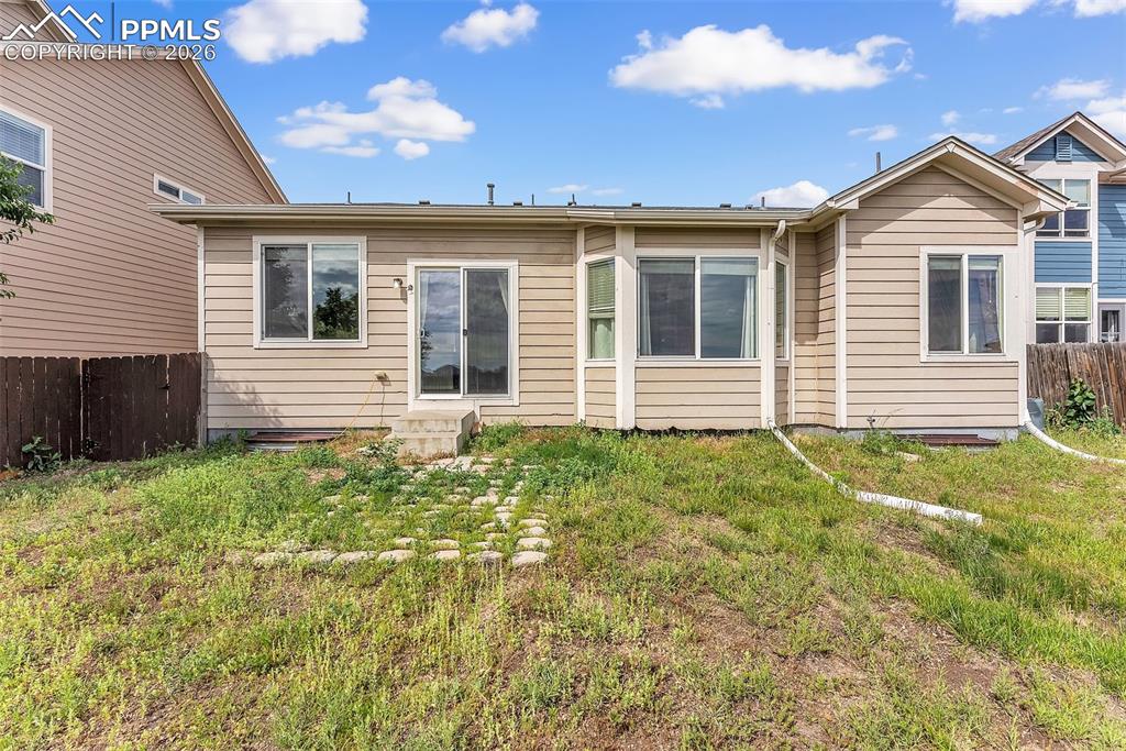 9403 St.George Road Peyton, CO 80831 - Photo 39 of 39 a view of a house with brick walls