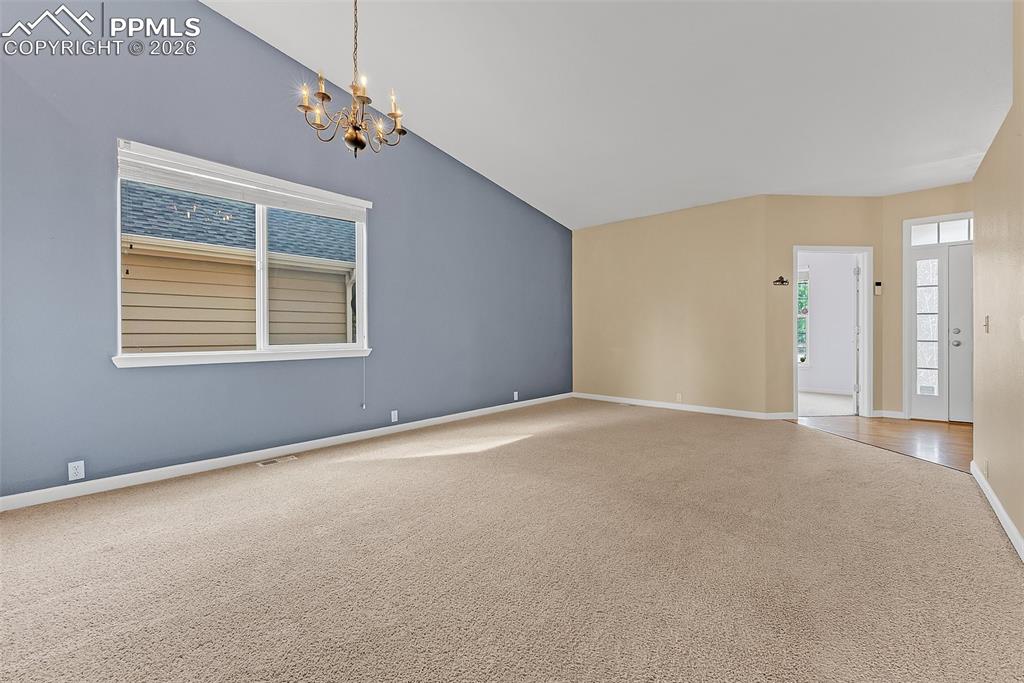 9403 St.George Road Peyton, CO 80831 - Photo 4 of 39 a view of an empty room with a window