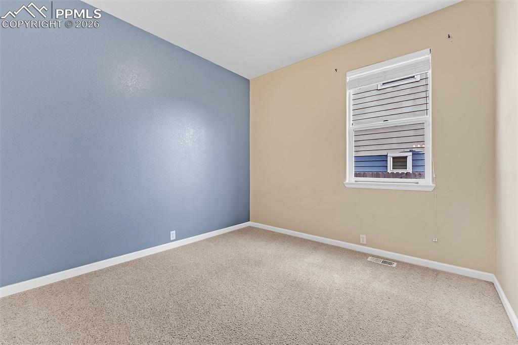 9403 St.George Road Peyton, CO 80831 - Photo 5 of 39 an empty room with a window