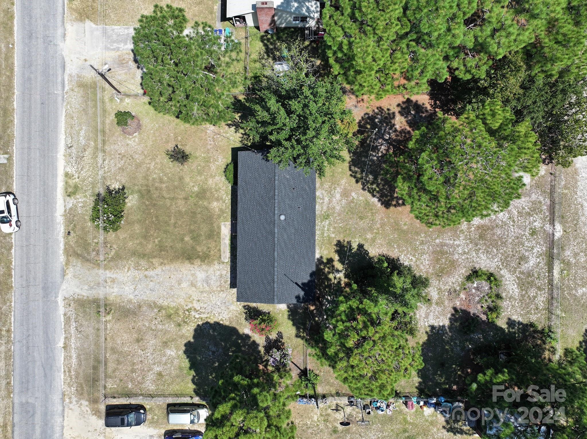131 Kristy Lane Rockingham, NC 28379 - Photo 11 of 35 an aerial view of a house with a yard